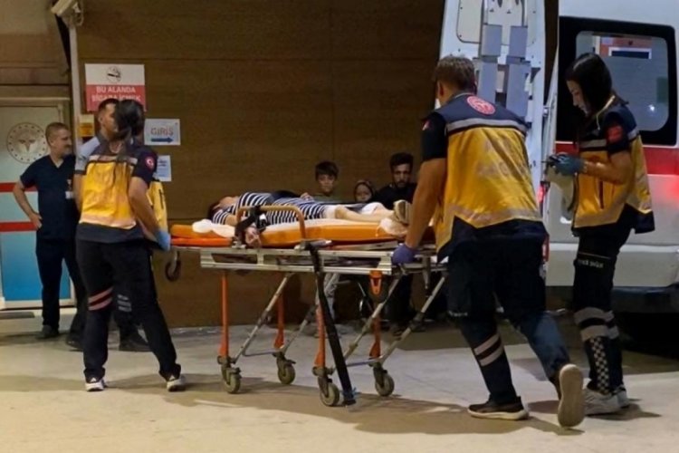 Bursa'da polise saldırı! Aranan şahsı yakınları teslim etmek istemedi...