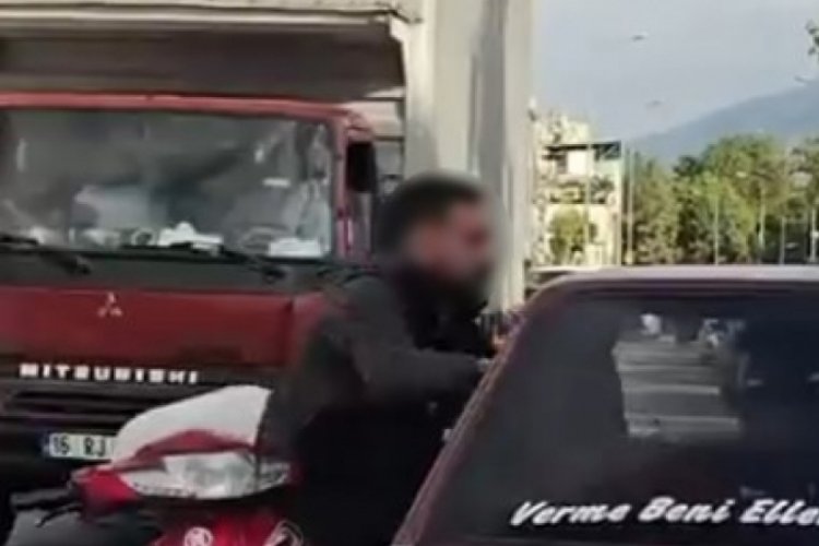 Bursa'da değişik kavga! Araçtan inmeyince camdan içeri girmeye çalıştı