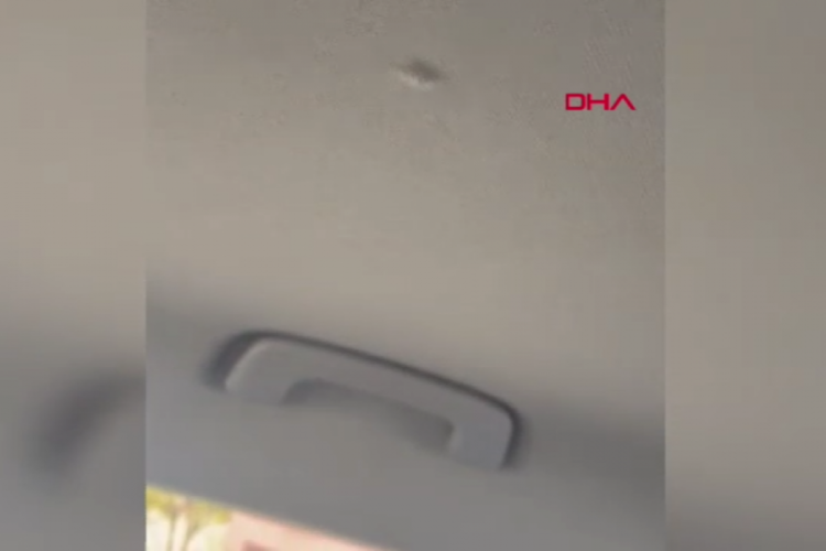 Yorgun mermi otomobilin tavanını deldi