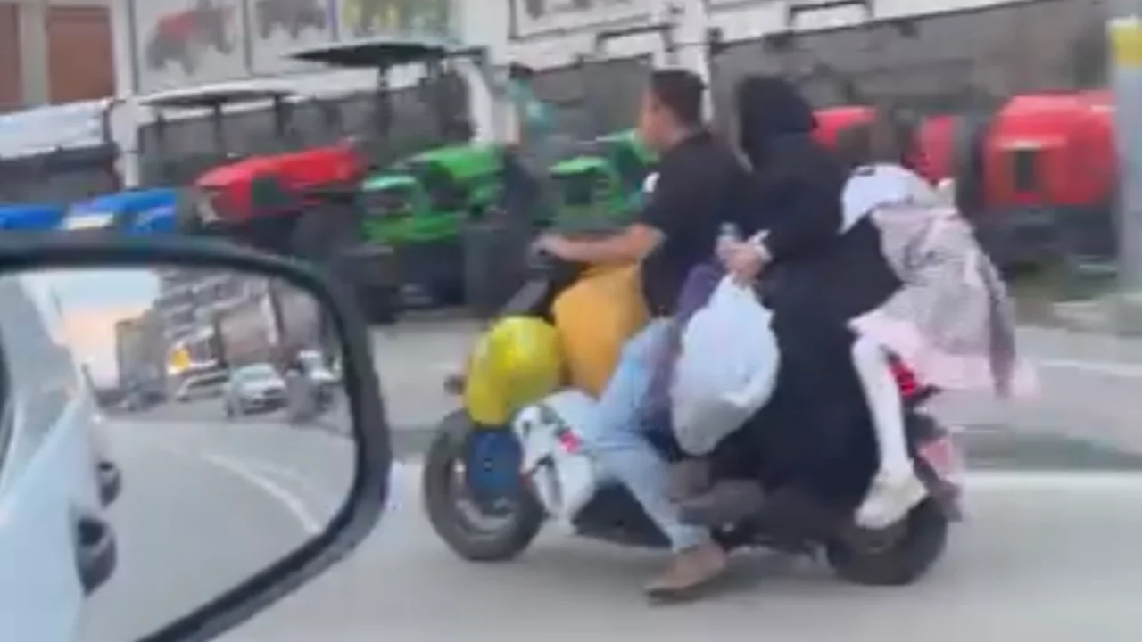 Bursa'da scooter üzerindeki aile yürekleri ağza getirdi