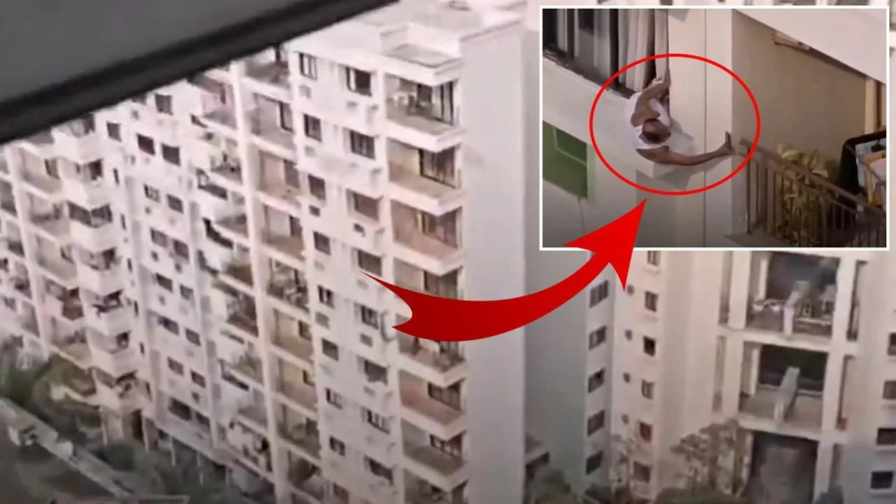 Sapkınlıkta son nokta! Metrelerce y&uuml;kseklikte pencereden sarkarak komşusunu g&ouml;zetledi