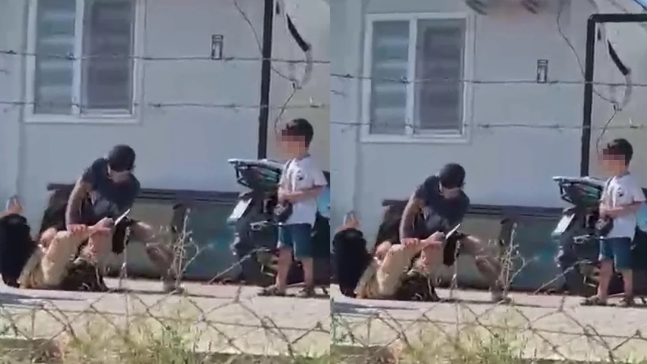 &Ccedil;ocuklarının g&ouml;zleri &ouml;n&uuml;nde eşini yere yatırıp darbetti