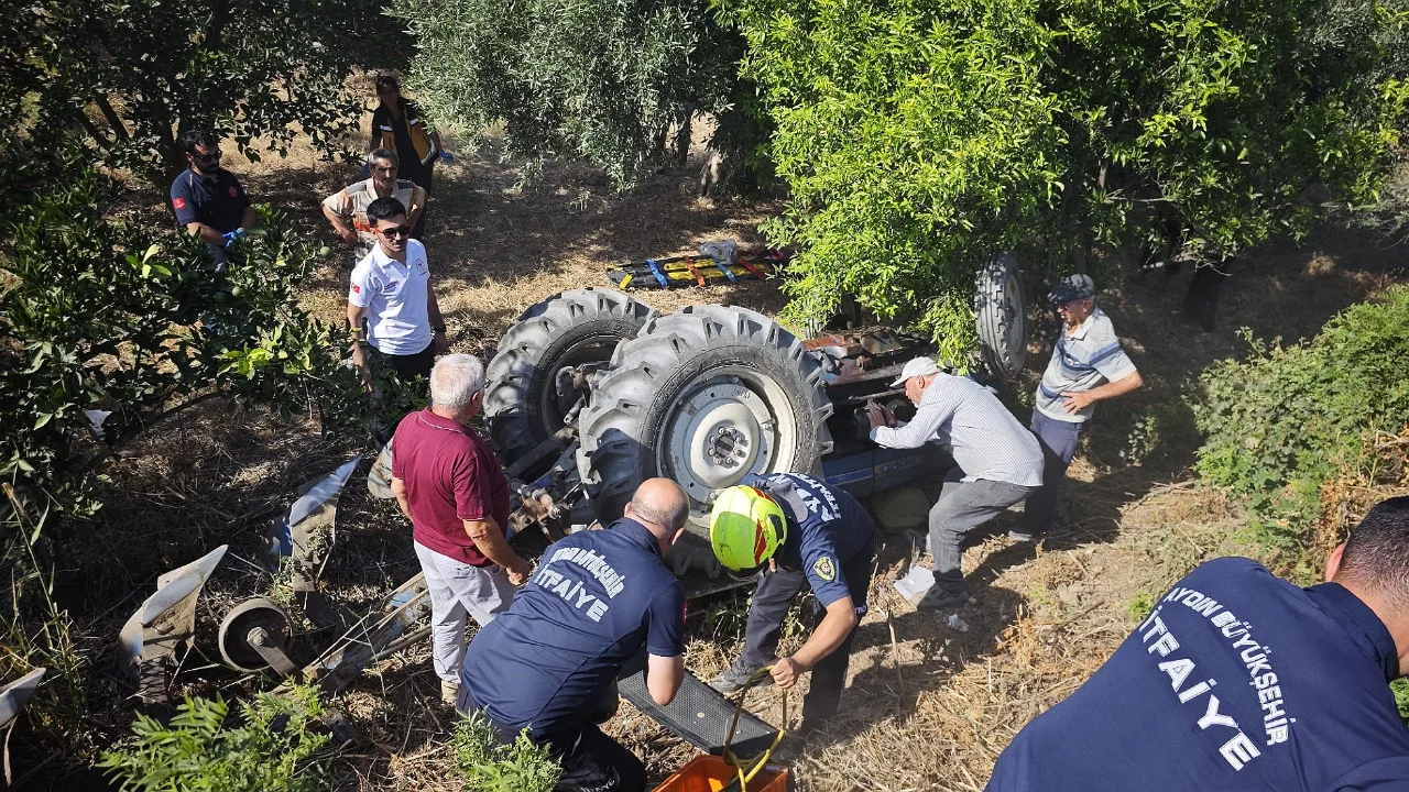 Devrilen traktörün altında kalan sürücü kurtarıldı