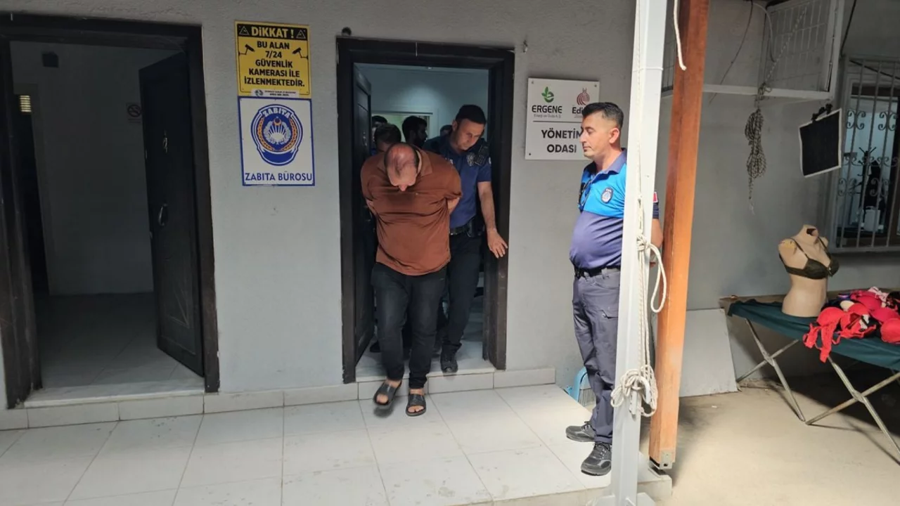 Pazar yerinde kadınların görüntülerini çeken şüpheliye gözaltı