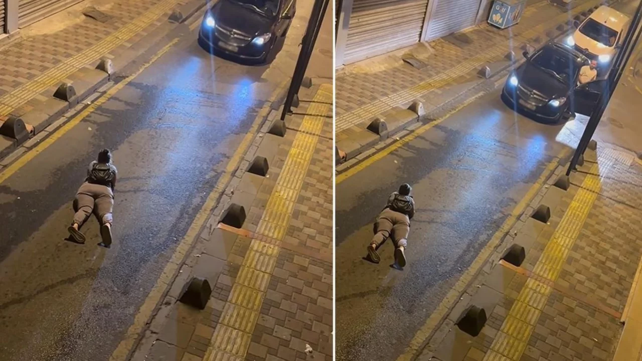 İstanbul'da ilgin&ccedil; g&ouml;r&uuml;nt&uuml;! Yolun ortasına yatıp telefonuyla oynadı