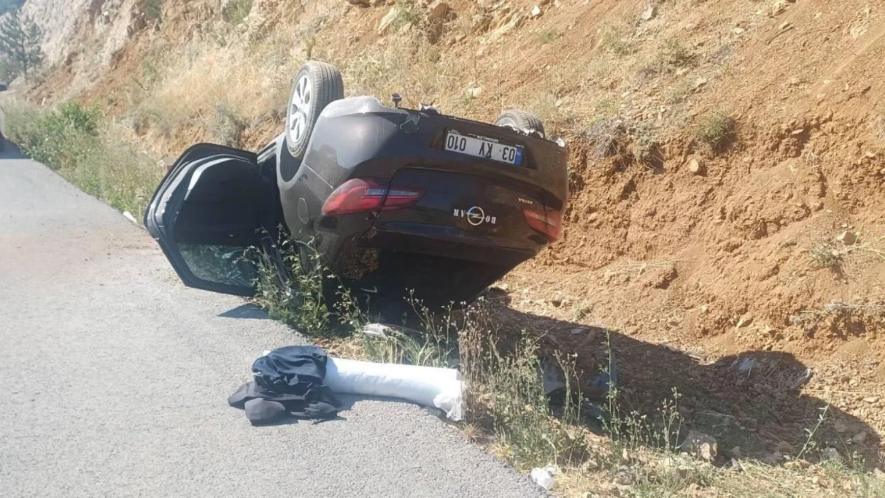 Takla atan otomobilde 2 kişi yaralandı