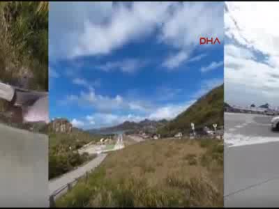 Uçak havaalanına inerken fotoğraf çeken turistin eline çarptı