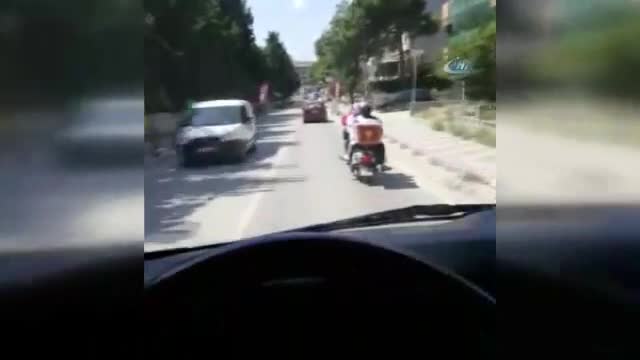 4 kişilik ailenin motosiklette tehlikeli yolculuğu