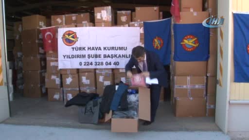 Bursa'da Türk Hava Kurumu binlerce öğrenciye kıyafet yardımı yaptı