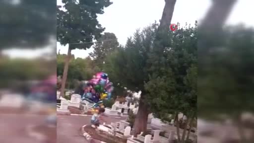 Antalyalı baloncunun yürek burkan mezarlık ziyareti