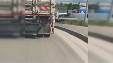 Bursa'da bir patenli genç kamyona tutunarak ilerledi!