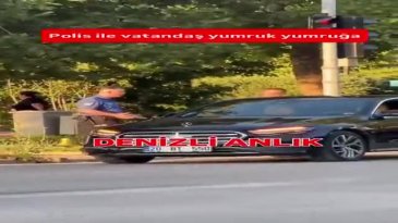 Polis ile iş insanı trafikte yumruk yumruğa kavga etti