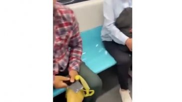Metroda gizlice kadınların fotoğrafını çekti: Fark edilince telefonunu kırdı