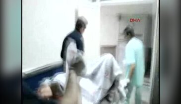 Başından vurulan kadın otomobilden atıldı