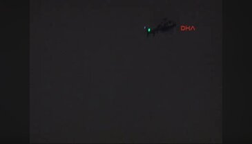 Polis helikopterine lazer tuttular