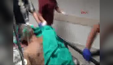 Eylemi izlerken balkonda yaralandı