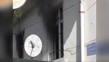 Evinin yandığını görünce sinir krizi geçirdi