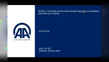 Fethiye'de kayalıklara takılan paraşütçü kurtarıldı