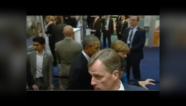 Obama ve Merkel birlikte Hannover Sanayi Fuarı'nı gezdi
