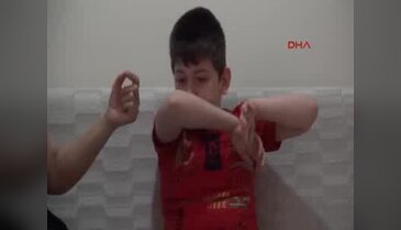 Oğlunu sırtında taşıyan anneden yardım çağırısı