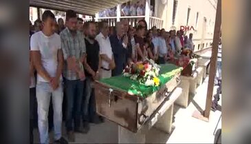 MHP'li başkan yardımcısı ve eşi toprağa verildi