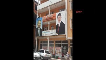 Davutoğlu'nun fotoğrafının üzerine başbakanın fotoğrafı yapıştırıldı