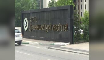 Orhangazi Üniversitesi'nin kapısına Cumhurbaşkanı Erdoğan'ın fotoğrafı asıldı