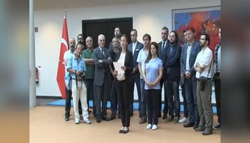 Berlin'de Türk gazetecilerden darbe girişimine kınama