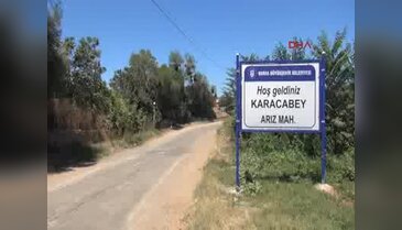 Bursa'da Yarbay Türkkan'ın köyü bayraklarla donatıldı