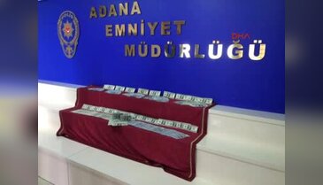 FETÖ'den aranan iş adamına 100 bin dolar gönderirken yakalandı
