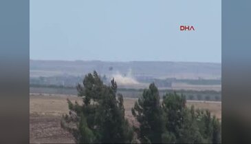 Muhaliflerle çatışan IŞİD'e karadan ve havadan müdahale