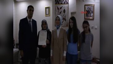 Başbakan'dan demokrası şehidinin gazi kızı ve eşine bayram tebriği