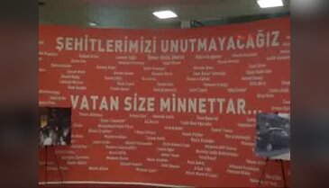 KAYMEK Sergisinde şehitlere saygı panosu
