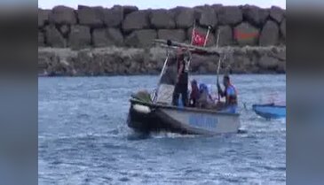 Tekneleri alabora olan Dragon bot takımını polis kurtardı