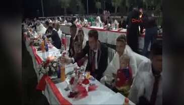 Karnı burnunda toplu nikahta