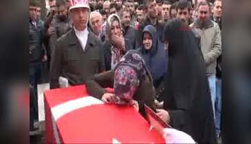 Şehit eşi 'Ne olur bizi bırakma' diye ağladı