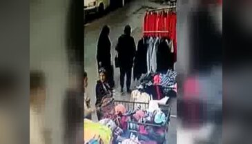 Suriyeli kadın, pazarda cüzdan çaldı