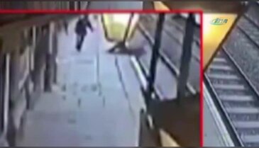 Tren bekleyen adamı raylara itti