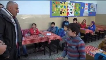 423 Suriyeli öğrenciye giysi ve ayakkabı yardımı