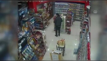 Bursa'da marketteki silahlı soygun anı kamerada