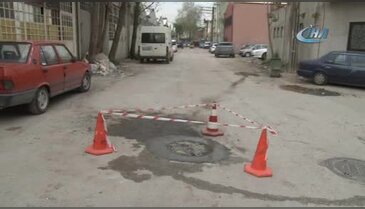 Bursa'da araçları uçuran rögar kapağı düzeltildi