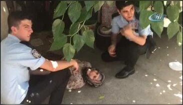 Polisin Zekiye Nine ile imtihanı: Dama çıktı, taş attı