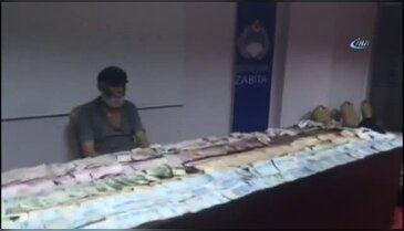 Dilencinin üstünden çıkan parayı 8 zabıta sayabildi