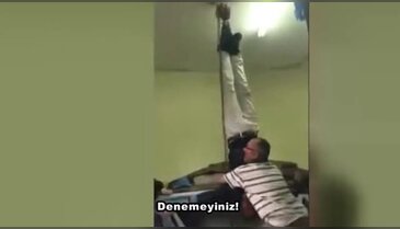 Yok böyle fıtık tedavisi! Ayaklarından tavana astı