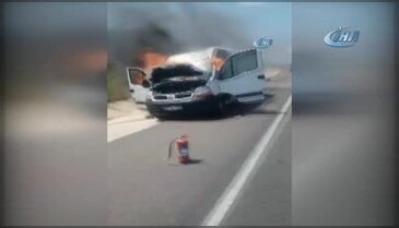 Alev alev yanan aracını böyle izledi