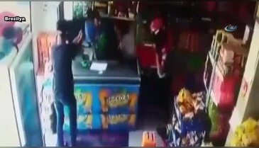 Market sahibini başından vurdular