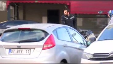 Piyango talihlisi olduğu iddia edilen kurye kameralara takıldı