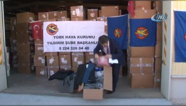 Bursa'da Türk Hava Kurumu binlerce öğrenciye kıyafet yardımı yaptı