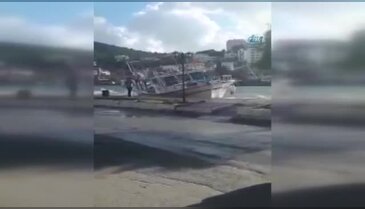 Batma tehlikesi geçiren tekneyi elleriyle tutmaya çalıştılar