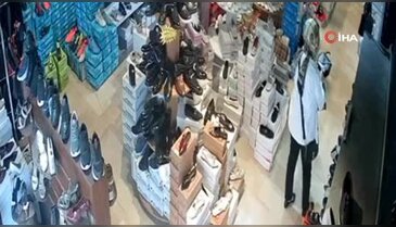 Müşteri gibi girdiği dükkandan çanta çalan kadın kamerada
